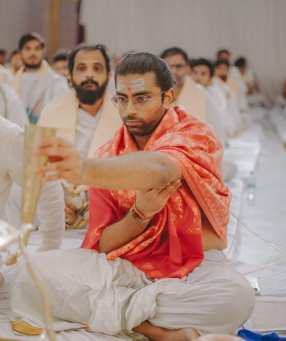 A devotee performing puja with Rudraksha